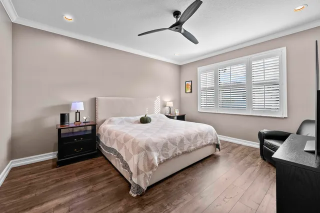 a bath room with a granite countertop sink and a mirror