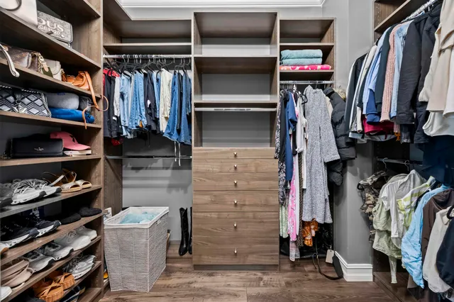 a bathroom with a tub sink and a mirror