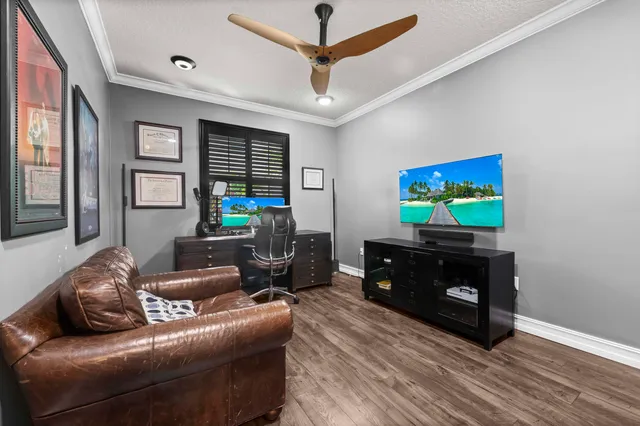 an aerial view of a house with a garden