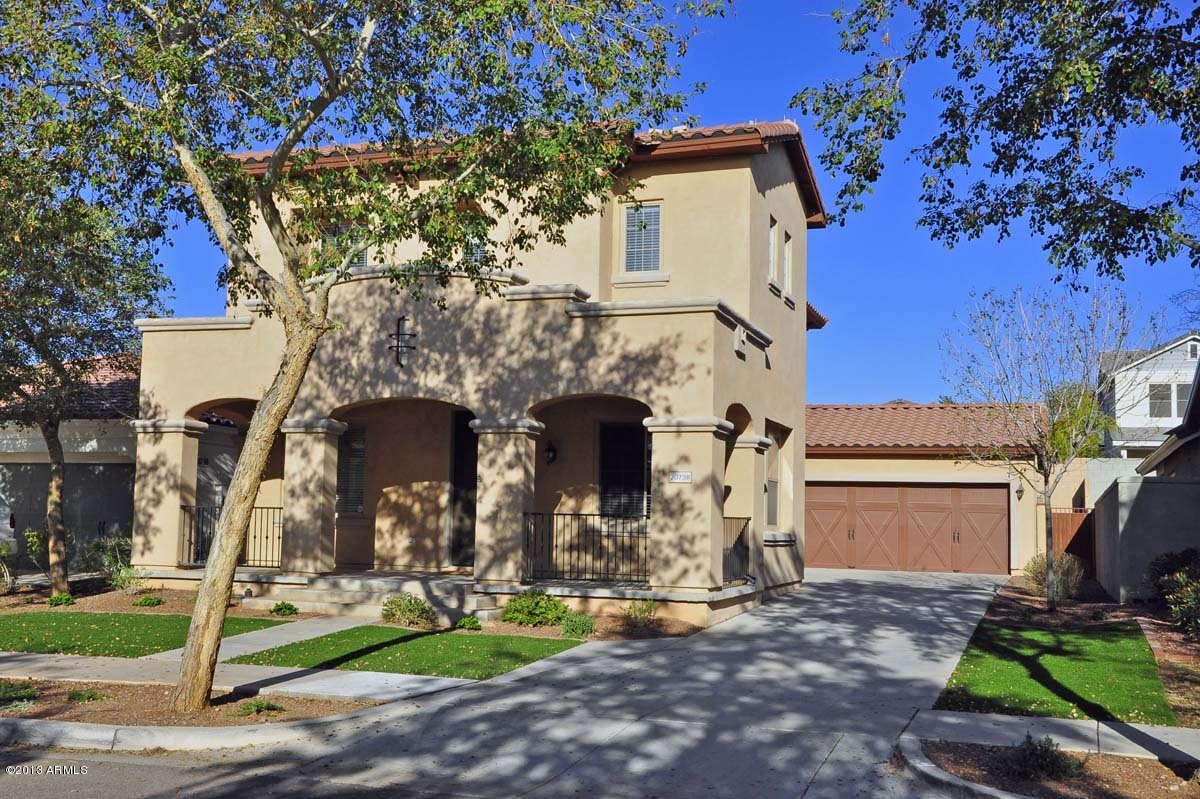 20798 West Ridge Road Buckeye, AZ 85396 - Photo 1 of 47 a front view of a house with garden