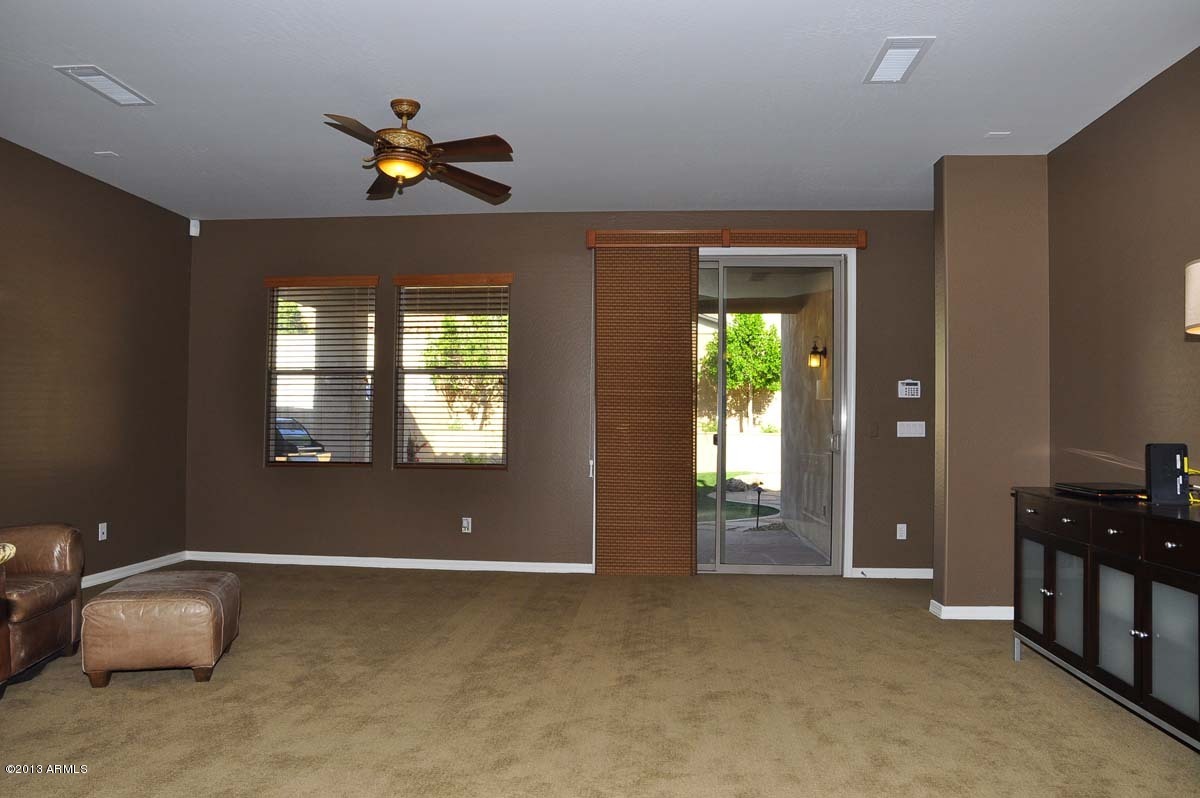 20798 West Ridge Road Buckeye, AZ 85396 - Photo 19 of 47 a view of livingroom with furniture and windows