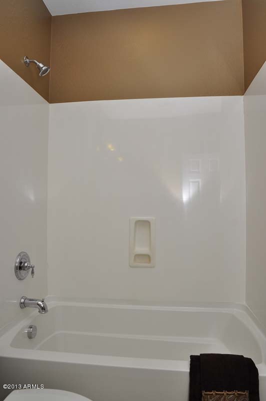 20798 West Ridge Road Buckeye, AZ 85396 - Photo 35 of 47 a bathroom with a bathtub