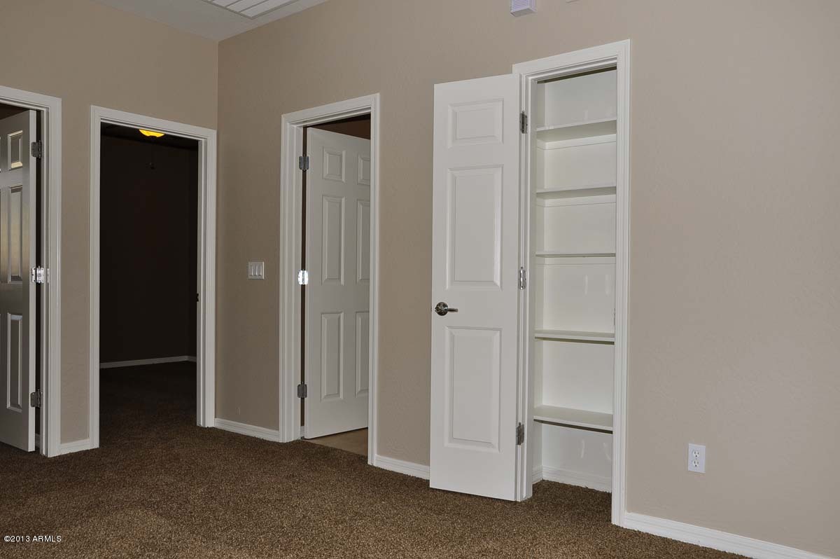 20798 West Ridge Road Buckeye, AZ 85396 - Photo 36 of 47 an empty room with closet area