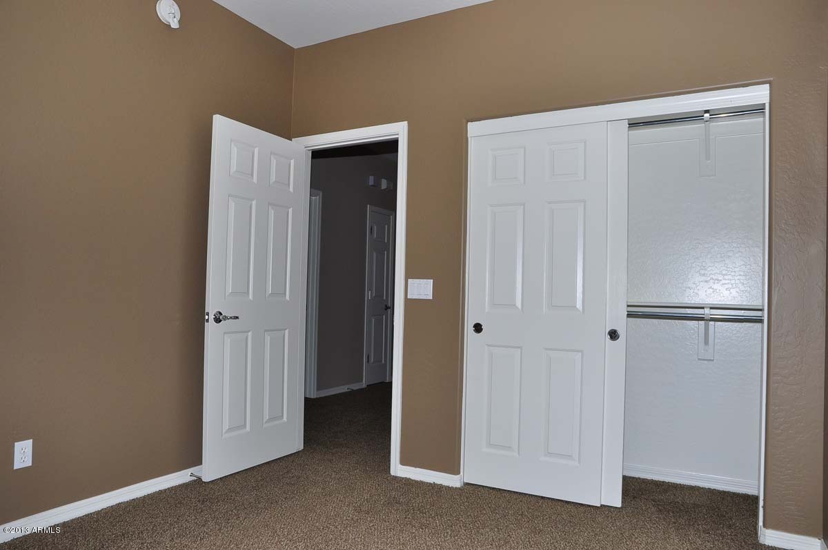 20798 West Ridge Road Buckeye, AZ 85396 - Photo 37 of 47 a view of a room with closet area