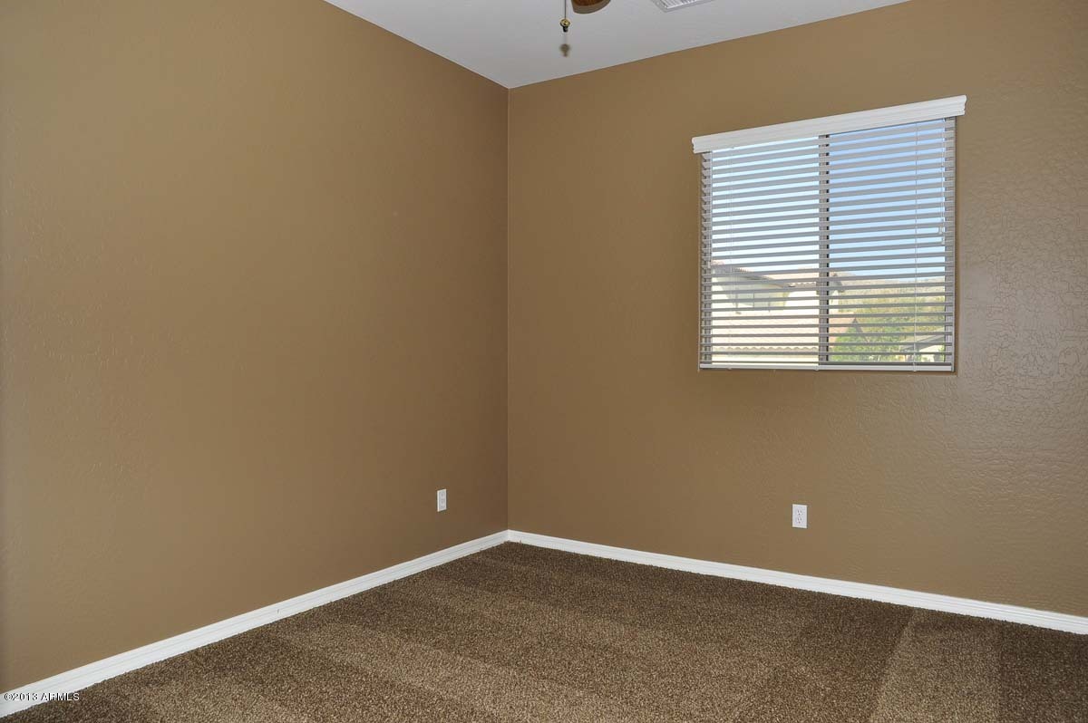 20798 West Ridge Road Buckeye, AZ 85396 - Photo 38 of 47 a view of an empty room with a window