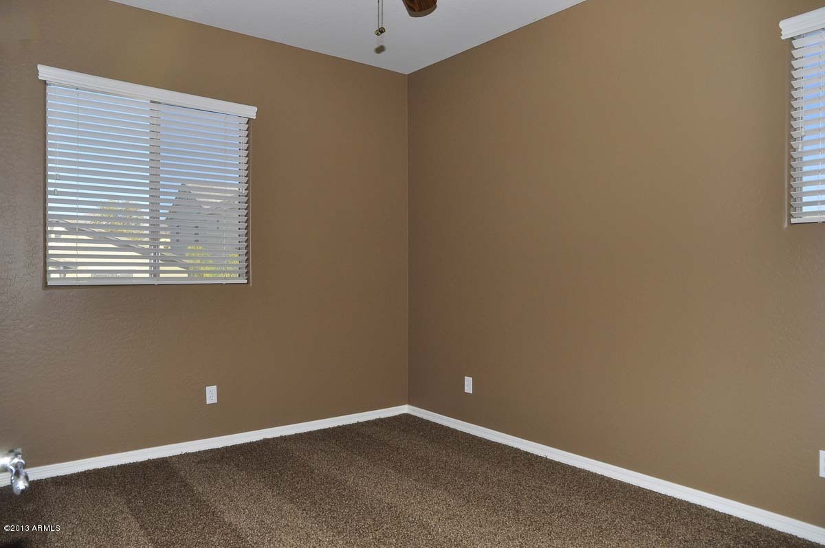 20798 West Ridge Road Buckeye, AZ 85396 - Photo 41 of 47 an empty room with a window