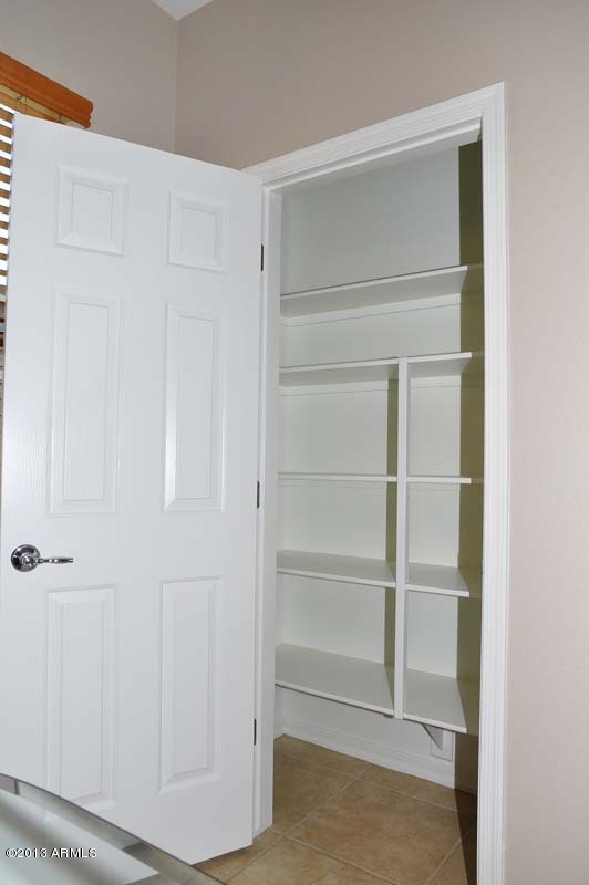 20798 West Ridge Road Buckeye, AZ 85396 - Photo 43 of 47 a view of walk in closet with empty racks