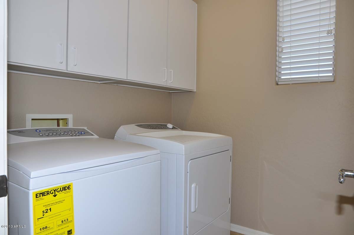 20798 West Ridge Road Buckeye, AZ 85396 - Photo 44 of 47 a utility room with dryer and washer