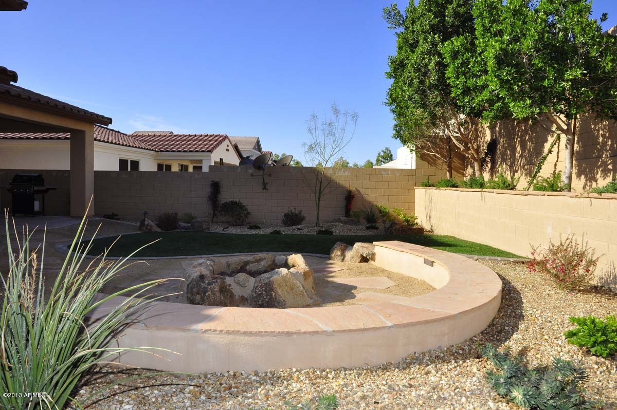 20798 West Ridge Road Buckeye, AZ 85396 - Photo 8 of 47 a view of a house with backyard and sitting area