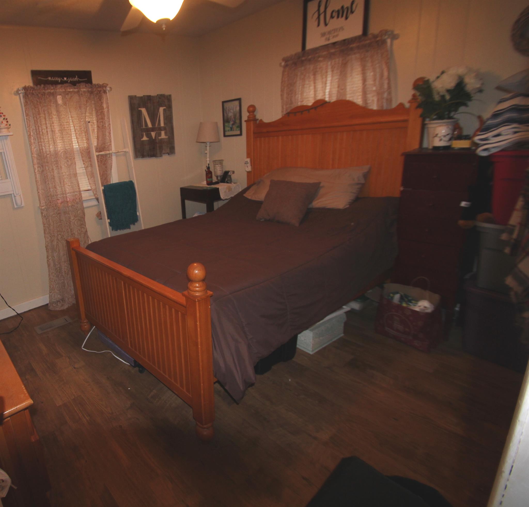 1090 Lambert Ridge Road Wartrace, TN 37183 - Photo 8 of 11 a bed sitting in a room next to a window