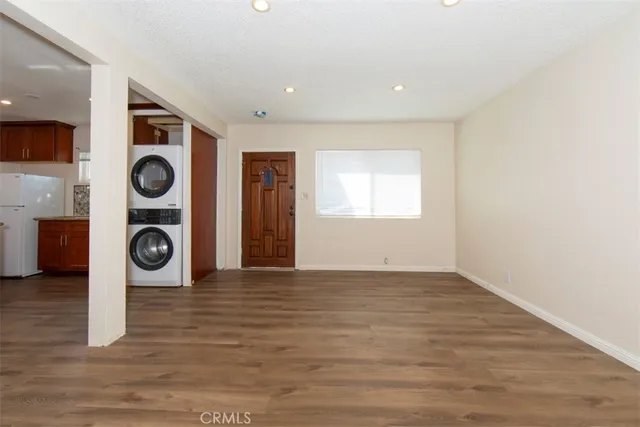 a view of entryway with wooden floor