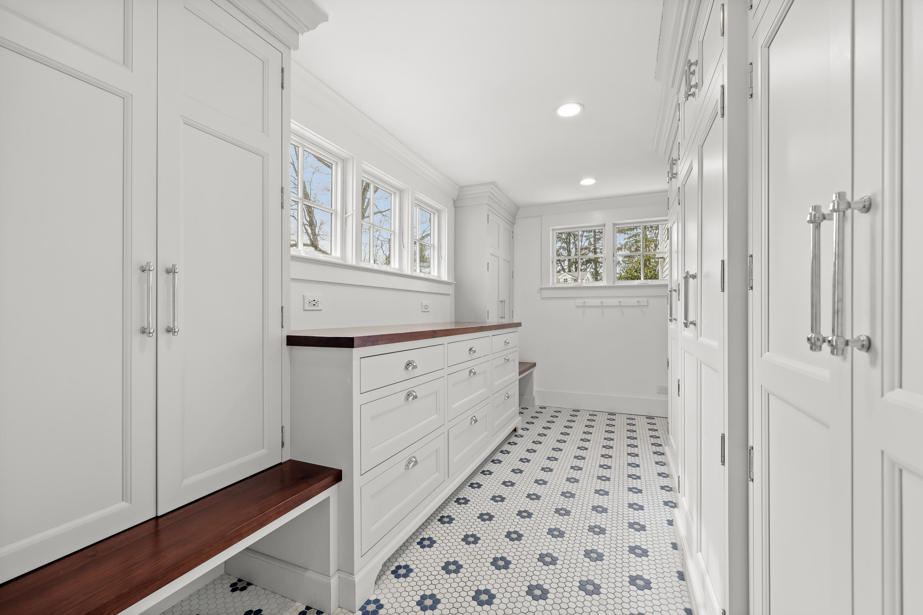 100 Hollow Tree Ridge Road Darien, CT 06820 - Photo 11 of 38 a bathroom with a sink a toilet a shower and a window
