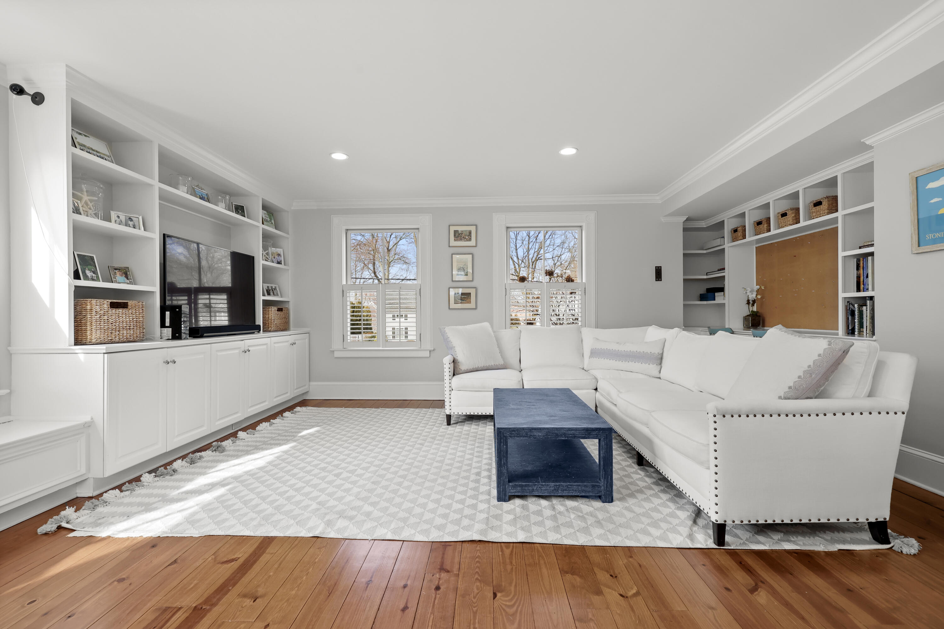 100 Hollow Tree Ridge Road Darien, CT 06820 - Photo 15 of 38 a living room with furniture and flat screen tv