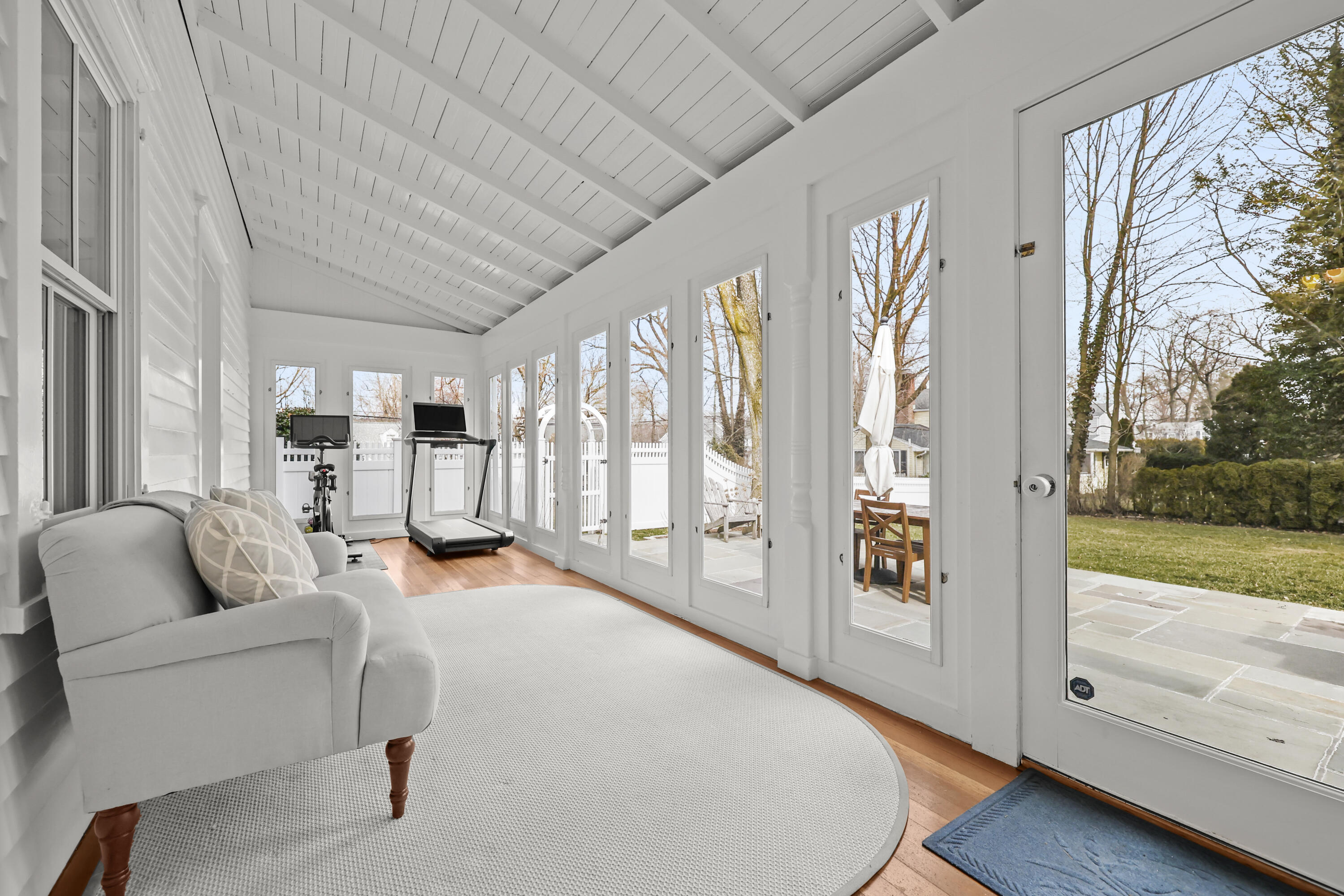 100 Hollow Tree Ridge Road Darien, CT 06820 - Photo 19 of 38 a living room with furniture and a large window