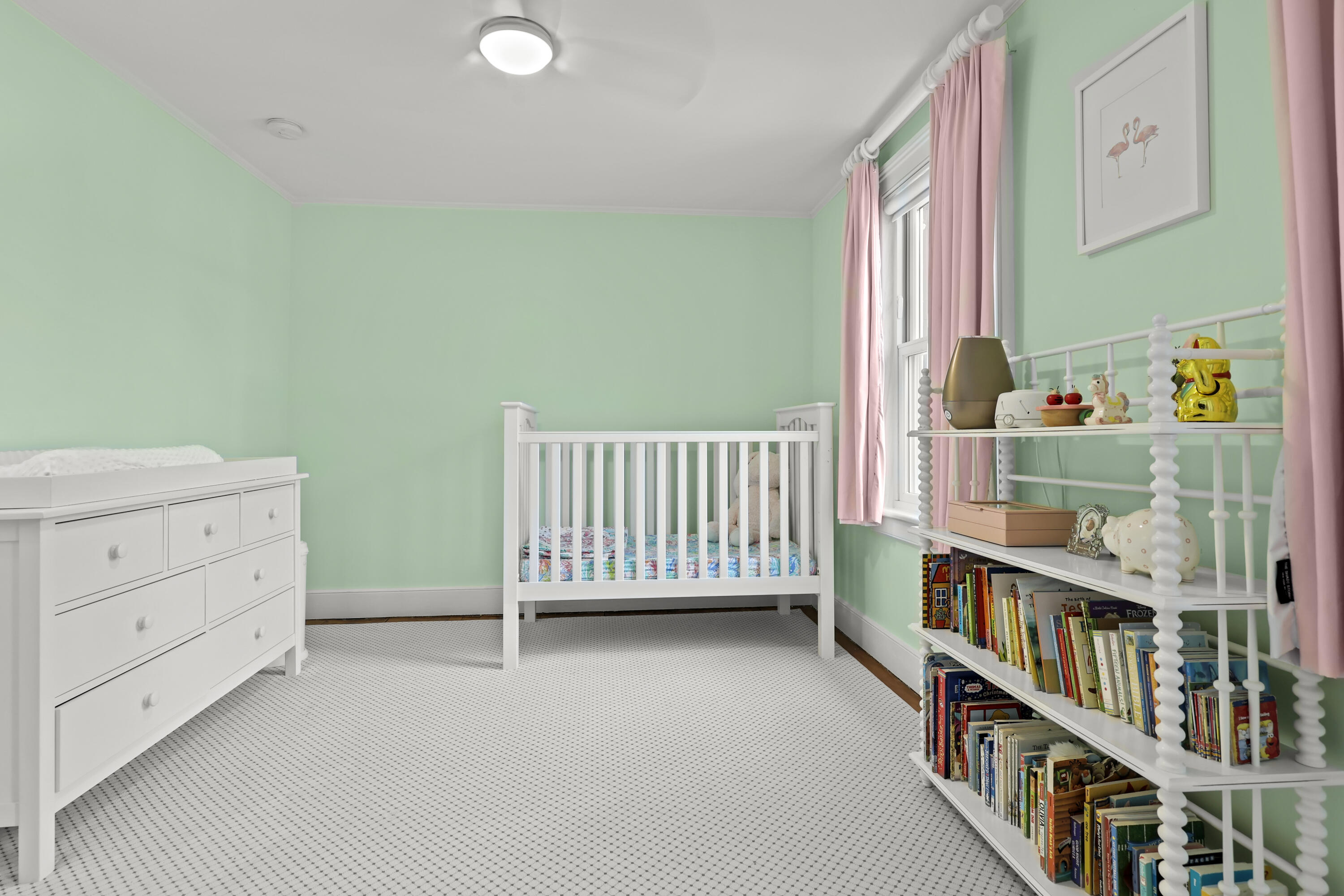 100 Hollow Tree Ridge Road Darien, CT 06820 - Photo 27 of 38 a view of a bedroom with baby crib and baby crib