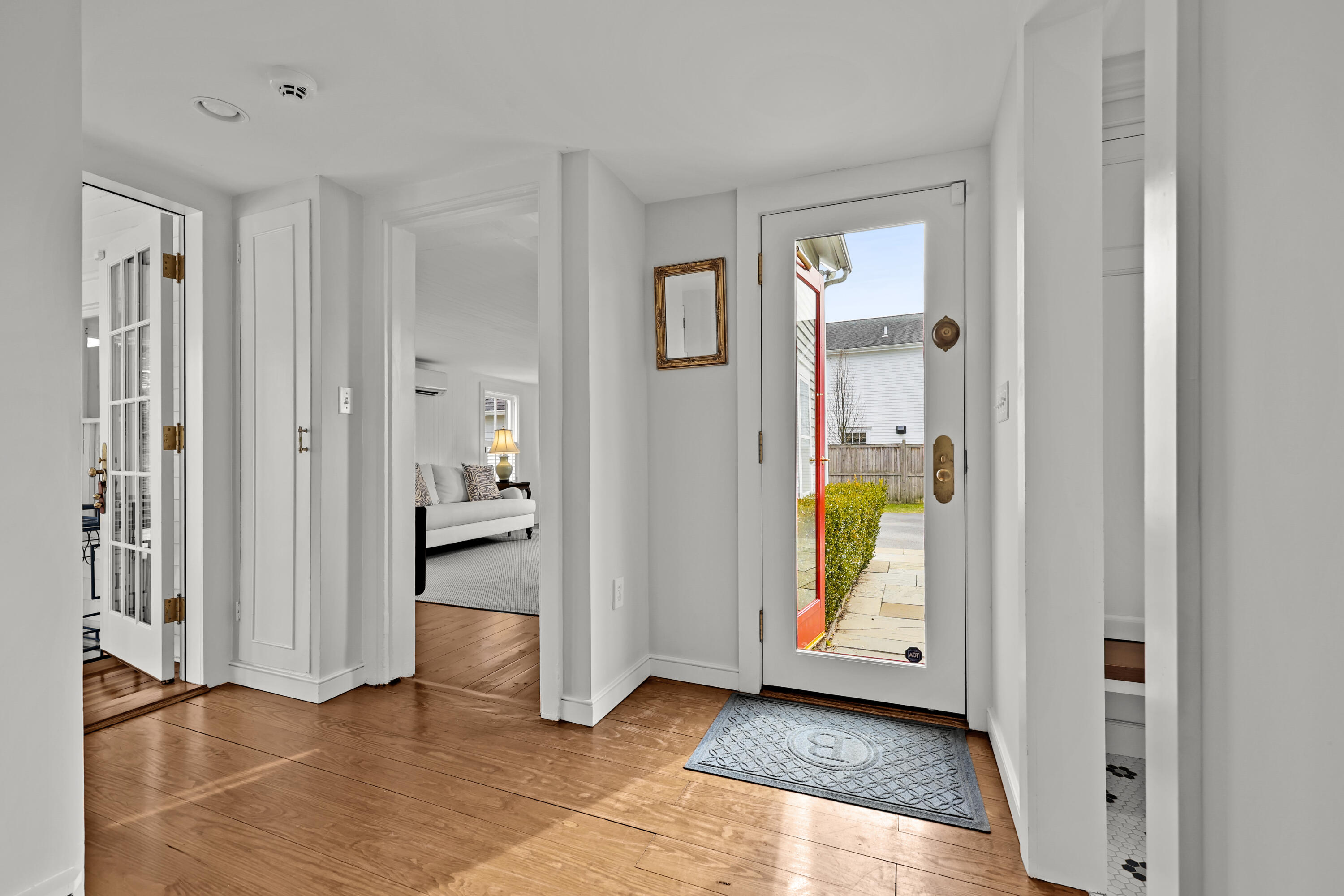 100 Hollow Tree Ridge Road Darien, CT 06820 - Photo 34 of 38 a view of an entryway with wooden floor and windows