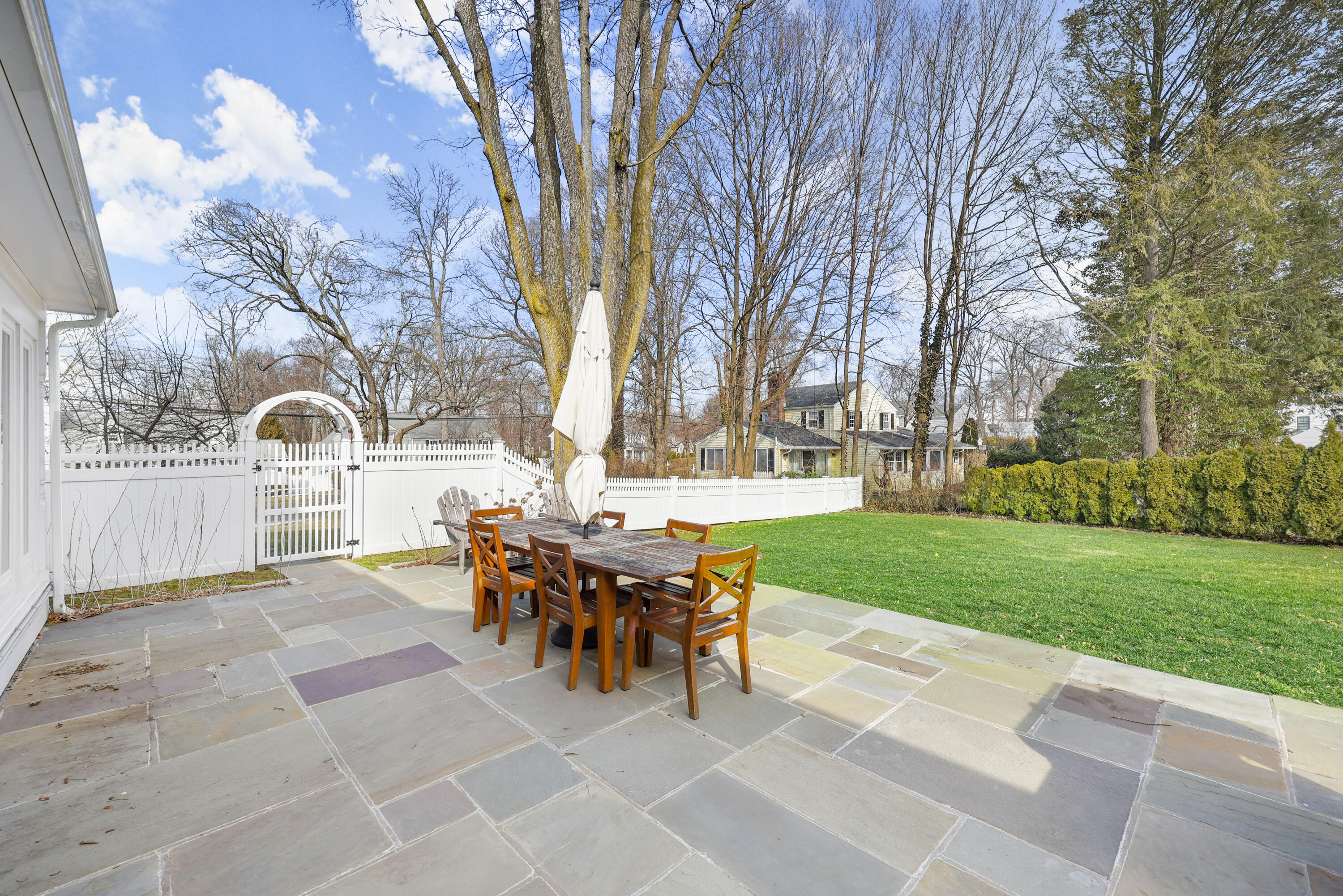 100 Hollow Tree Ridge Road Darien, CT 06820 - Photo 35 of 38 a view of a house with backyard and a tree