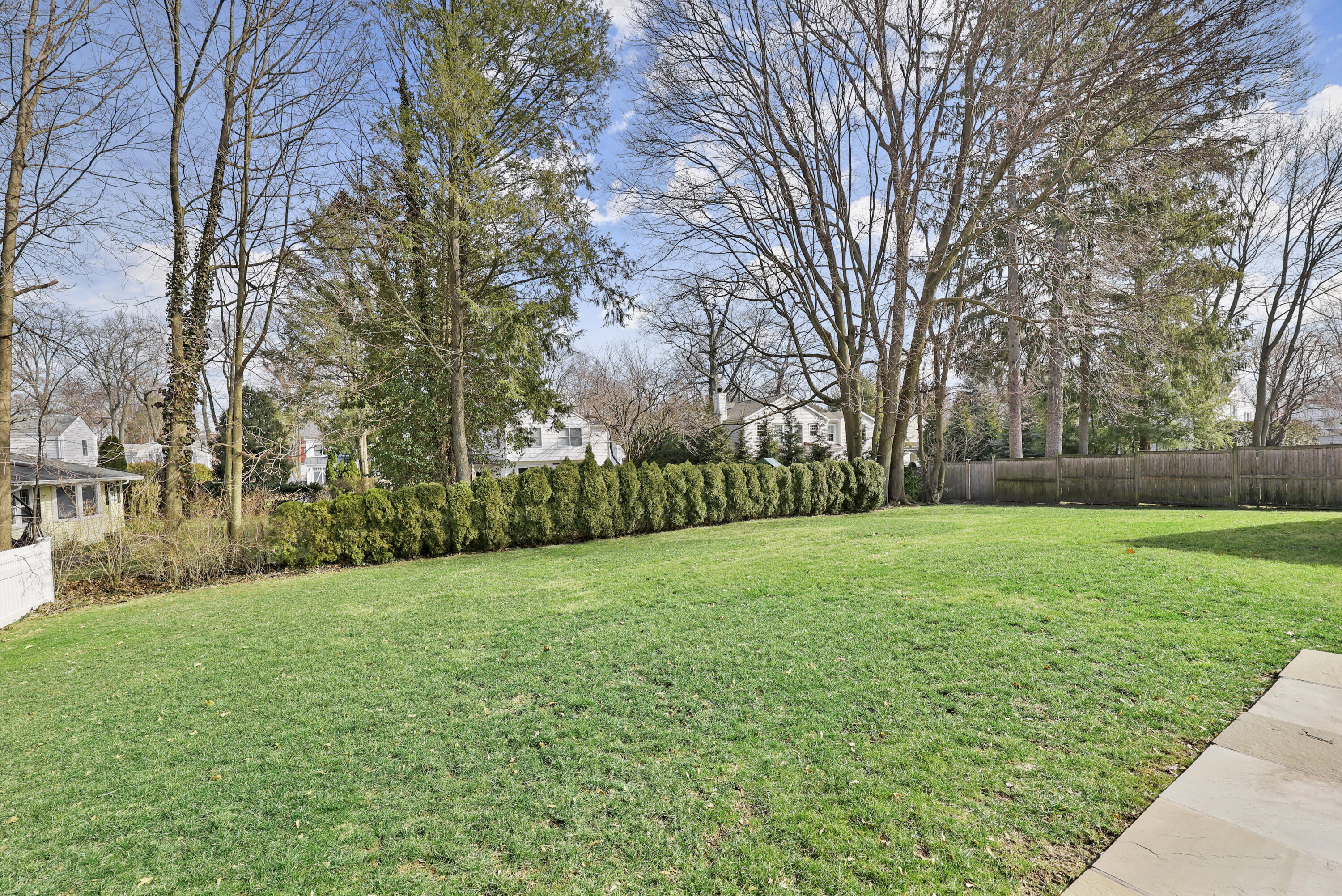 100 Hollow Tree Ridge Road Darien, CT 06820 - Photo 36 of 38 a view of a grassy field with trees