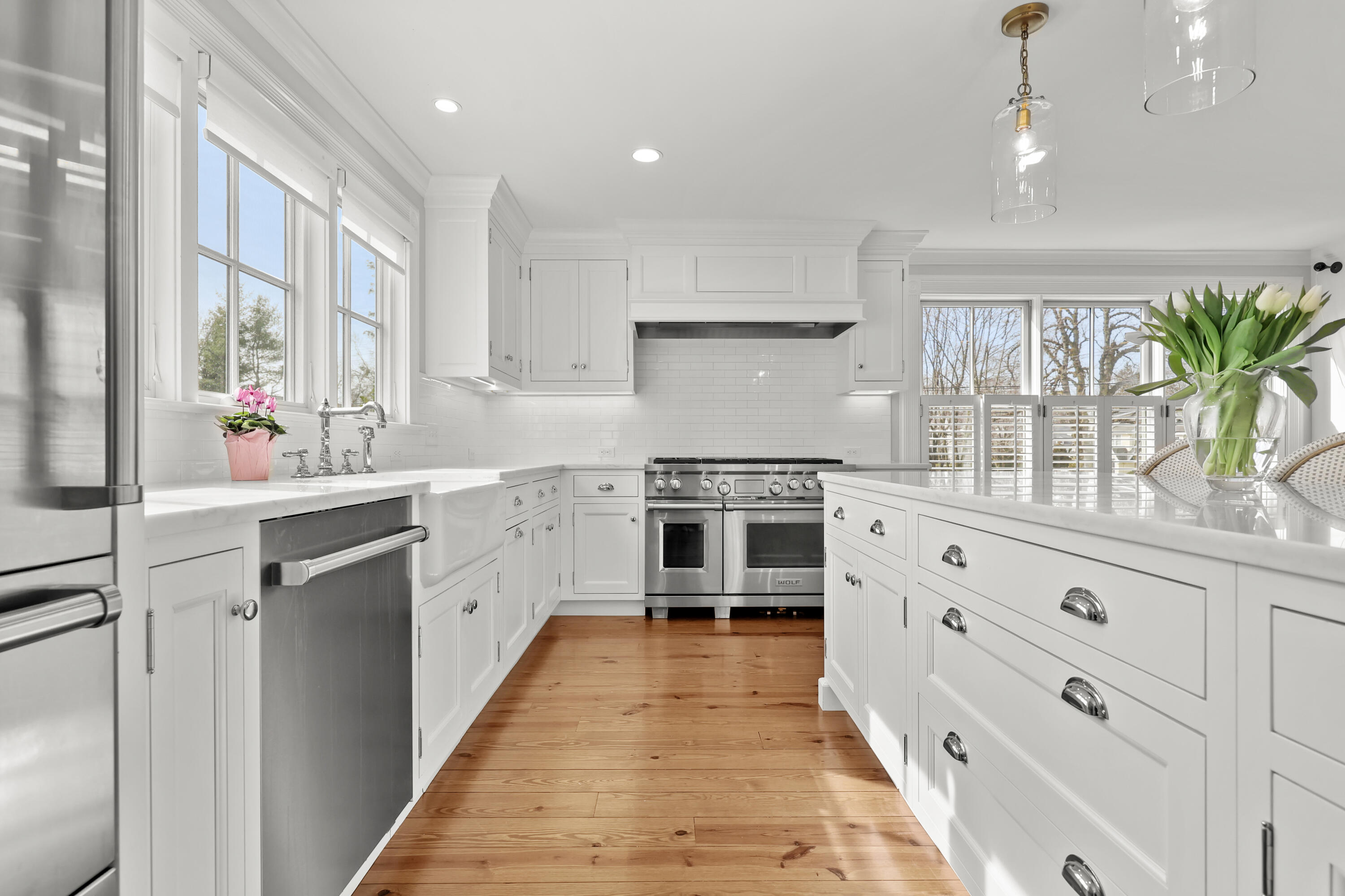 100 Hollow Tree Ridge Road Darien, CT 06820 - Photo 5 of 38 a kitchen with granite countertop a sink stainless steel appliances and cabinets