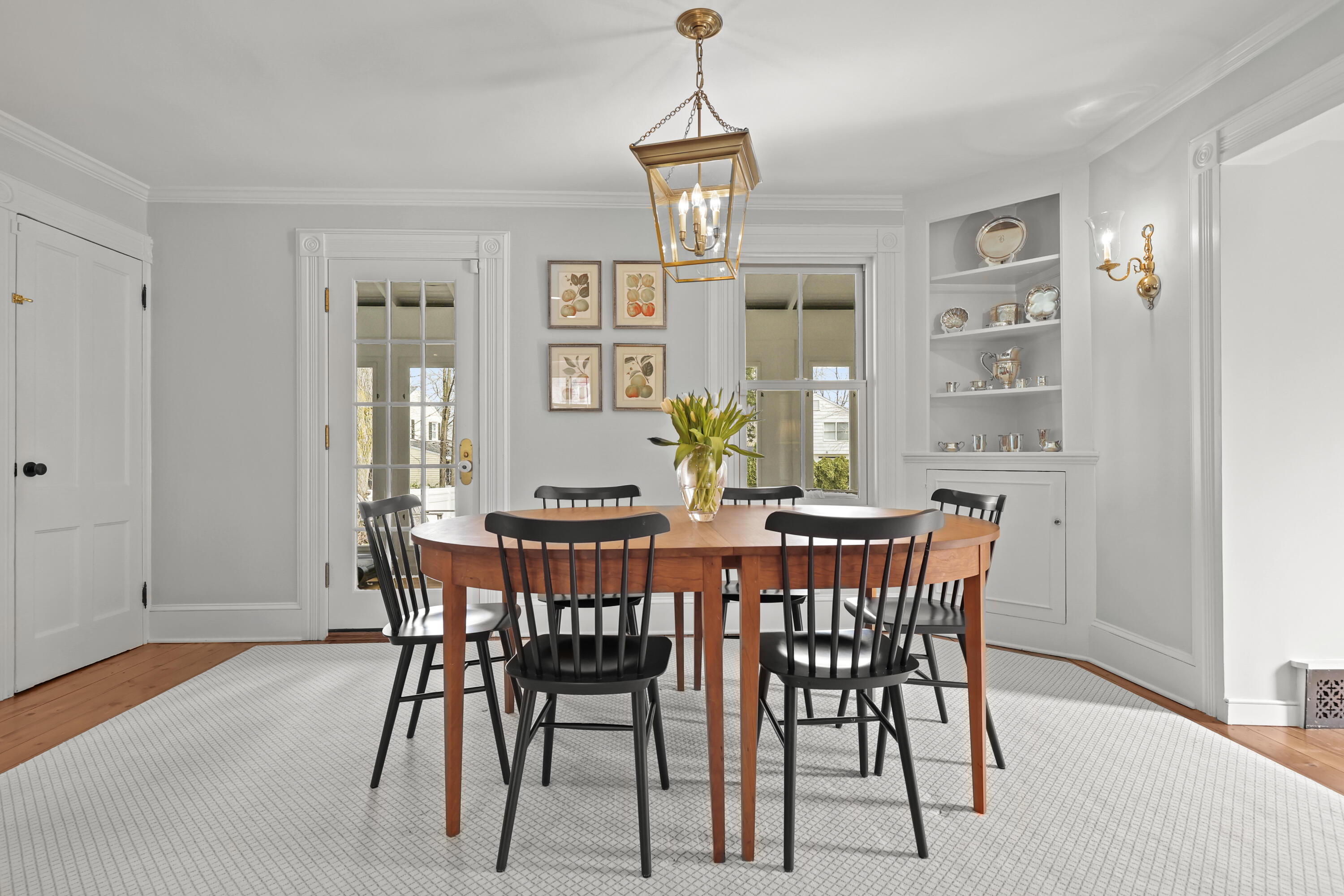 100 Hollow Tree Ridge Road Darien, CT 06820 - Photo 10 of 38 a view of a dining room with furniture window and wooden floor