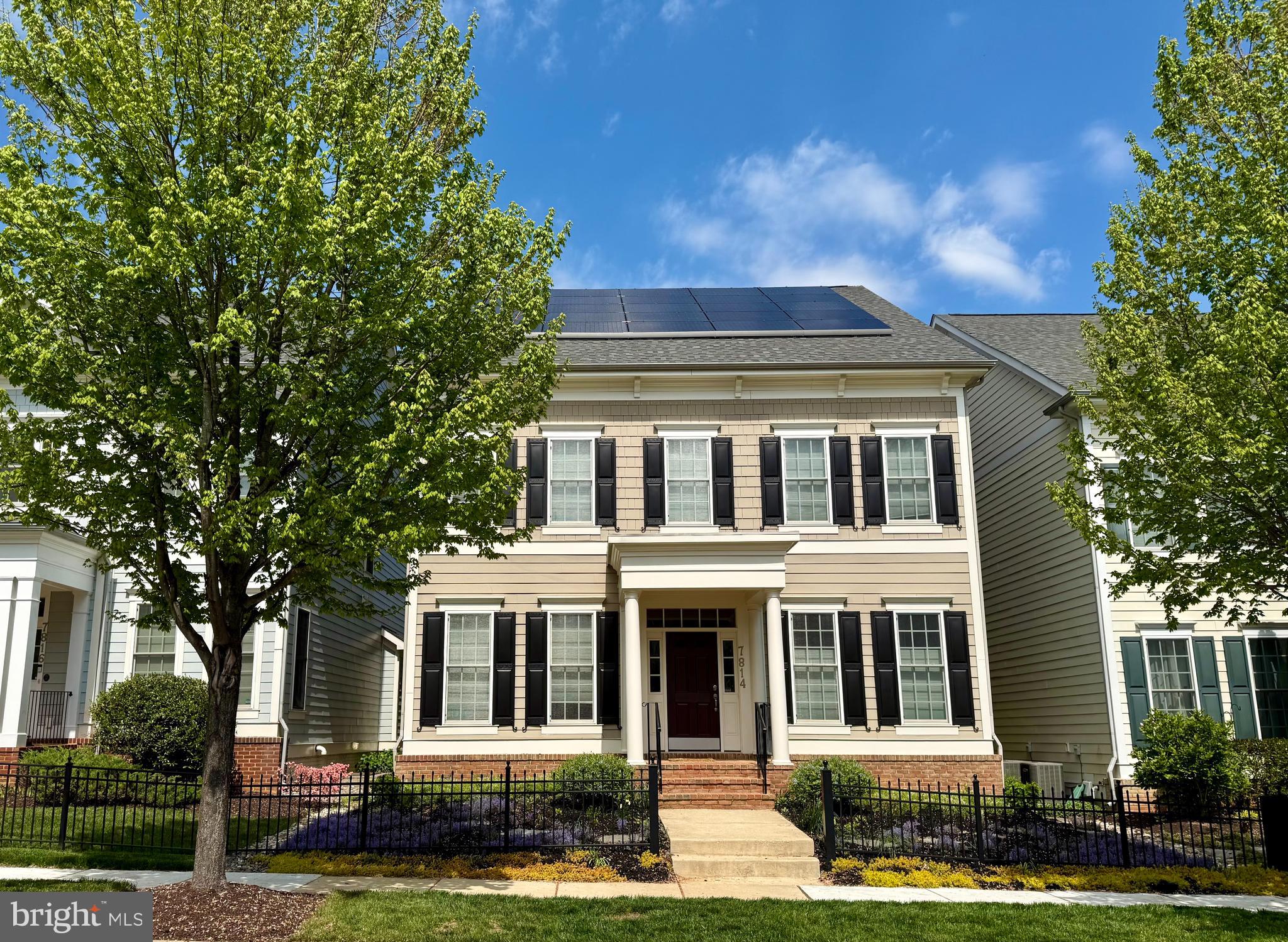 7814 Blue Ribbon Street Fulton, MD 20759 - Photo 1 of 1 front view of a house with a yard