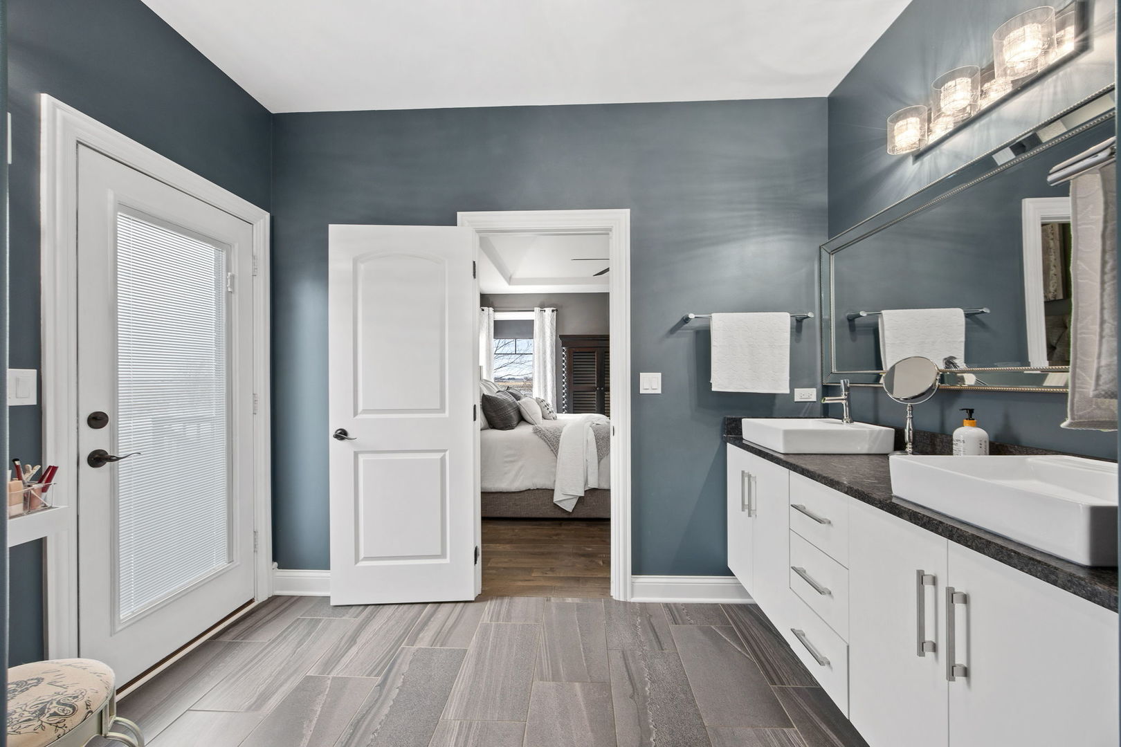 12549 Old Farm Road Manhattan, IL 60442 - Photo 15 of 66 a spacious bathroom with a double vanity sink and a mirror