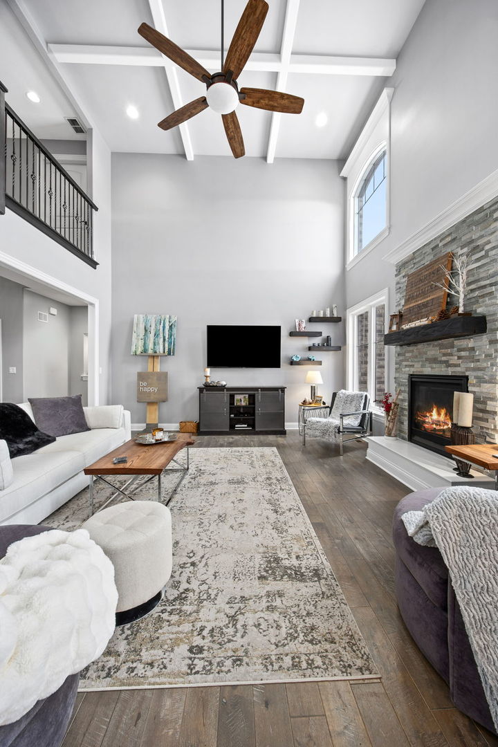 12549 Old Farm Road Manhattan, IL 60442 - Photo 20 of 66 a living room with furniture and a fireplace