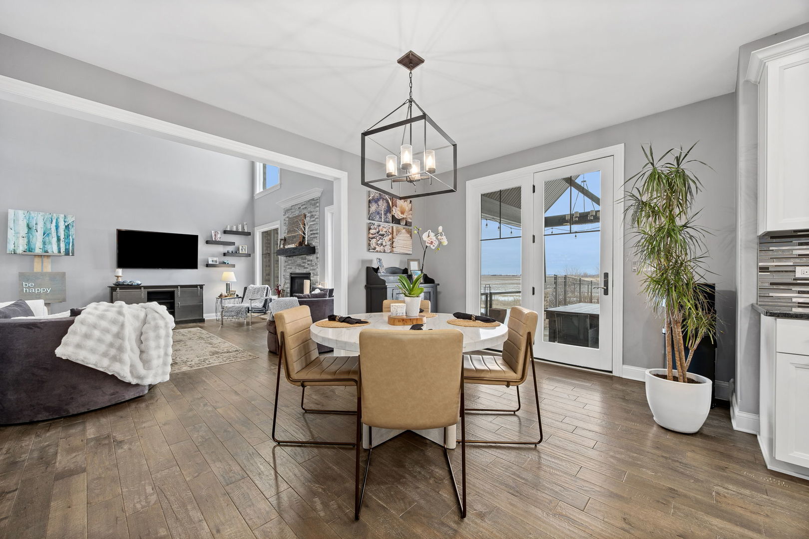 12549 Old Farm Road Manhattan, IL 60442 - Photo 28 of 66 a view of a dining room with furniture window and wooden floor
