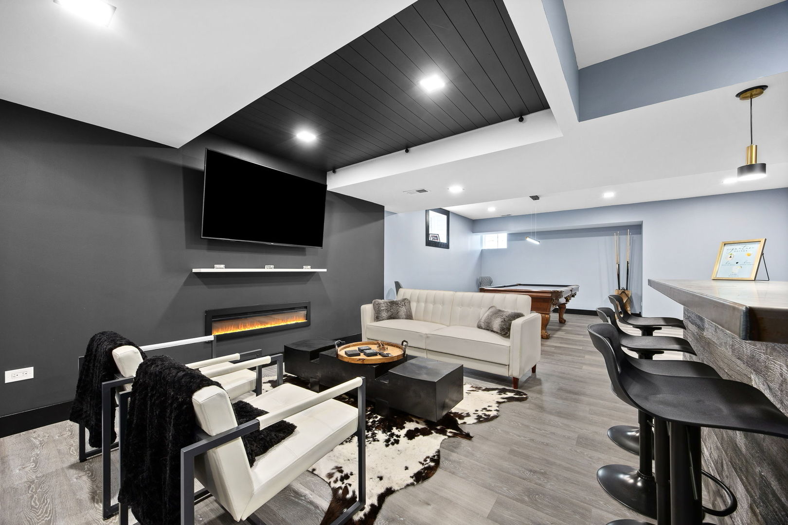 12549 Old Farm Road Manhattan, IL 60442 - Photo 30 of 66 a living room with furniture and a flat screen tv