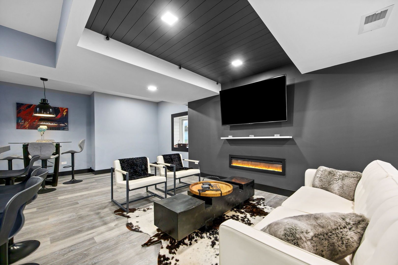 12549 Old Farm Road Manhattan, IL 60442 - Photo 33 of 66 a living room with furniture and a flat screen tv