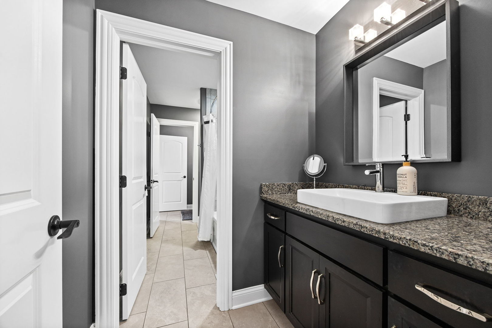 12549 Old Farm Road Manhattan, IL 60442 - Photo 39 of 66 a bathroom with a granite countertop sink vanity and mirror