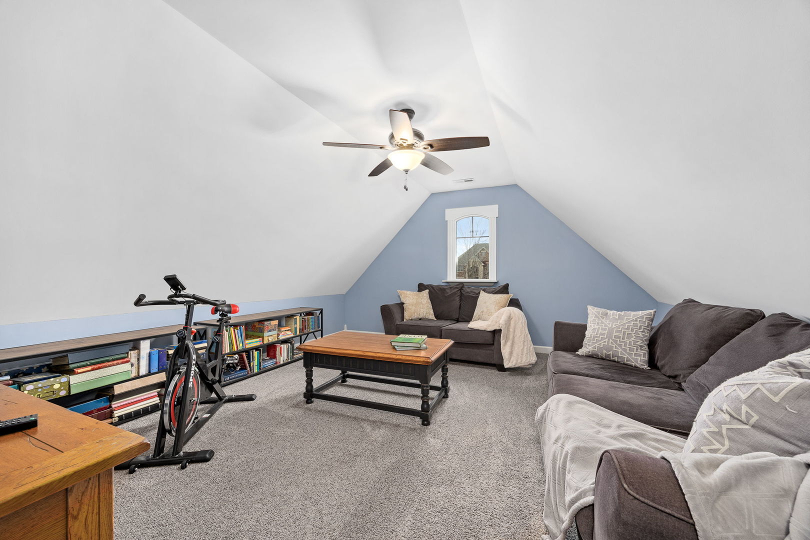 12549 Old Farm Road Manhattan, IL 60442 - Photo 42 of 66 a living room with furniture and a chandelier