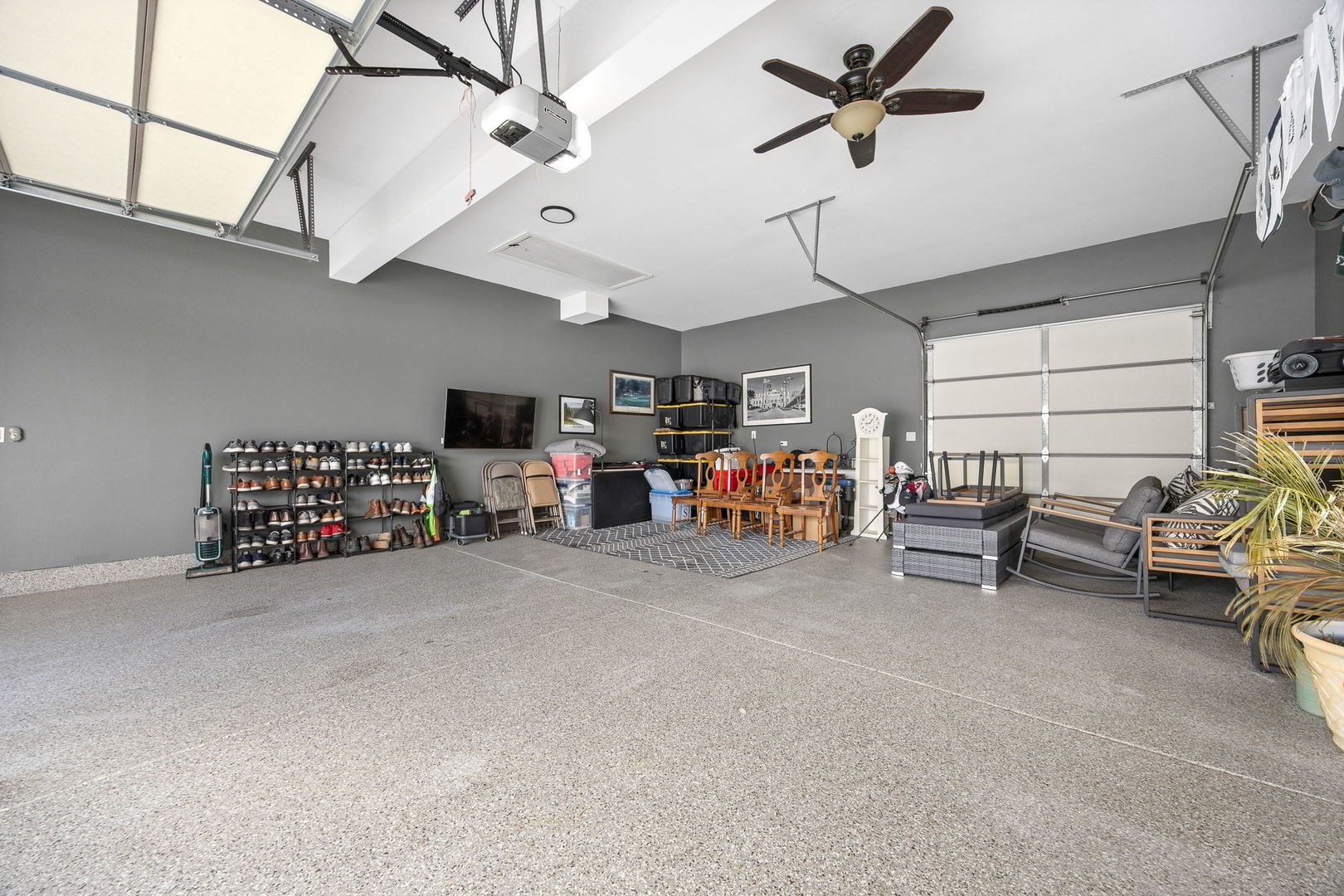 12549 Old Farm Road Manhattan, IL 60442 - Photo 48 of 66 a big room with lots of furniture and a chandelier