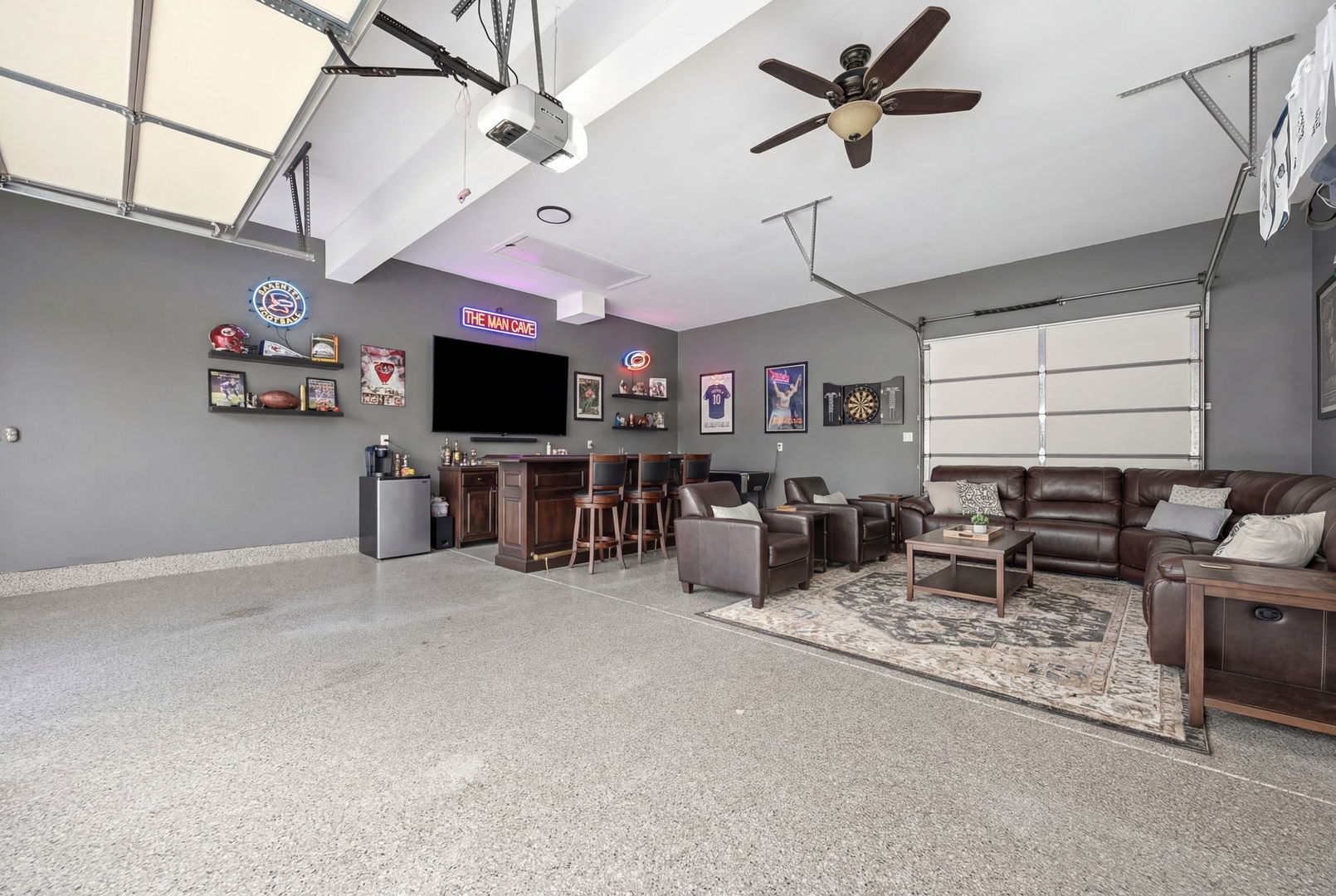 12549 Old Farm Road Manhattan, IL 60442 - Photo 49 of 66 a room with furniture and a flat screen tv