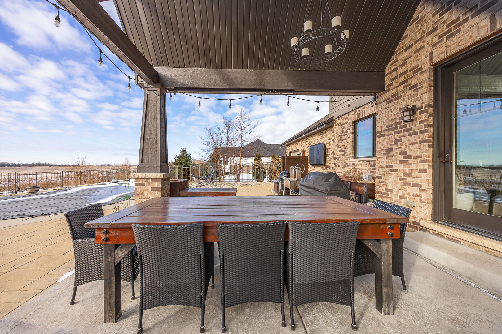 12549 Old Farm Road Manhattan, IL 60442 - Photo 56 of 66 a kitchen with a table chairs sink and cabinets