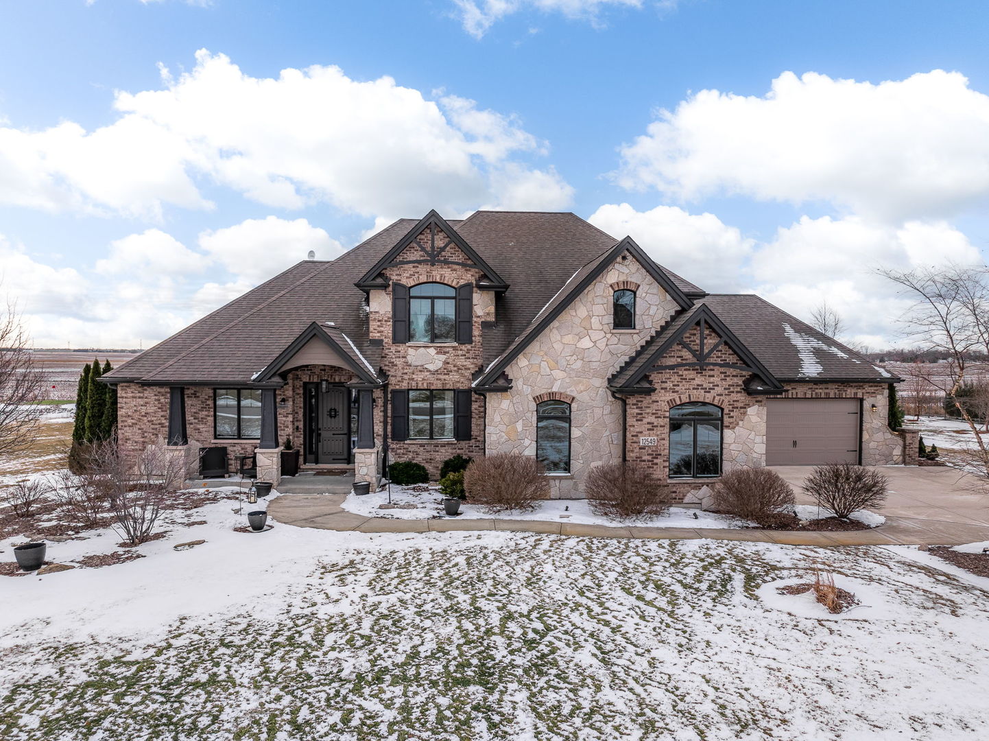 12549 Old Farm Road Manhattan, IL 60442 - Photo 62 of 66 a front view of a house with a yard