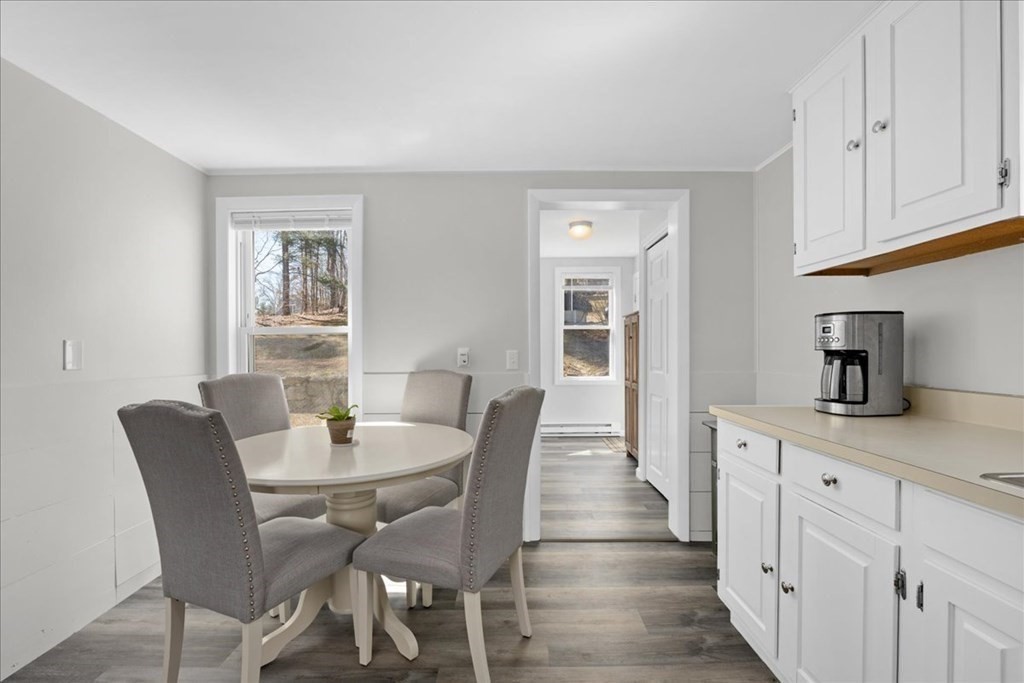 11 Merrill Road Sutton, MA 01590 - Photo 11 of 42 a view of a dining room with furniture and wooden floor