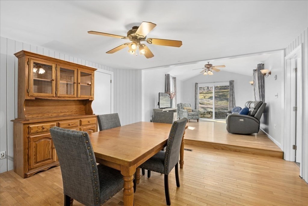 11 Merrill Road Sutton, MA 01590 - Photo 15 of 42 a view of a dining room with furniture and wooden floor