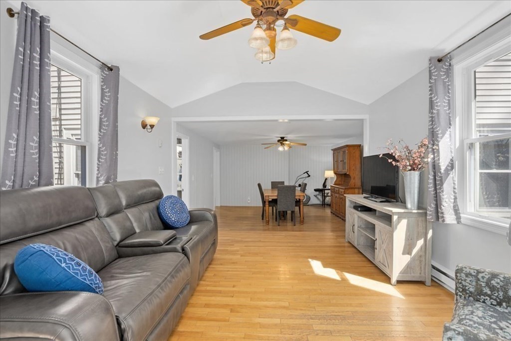 11 Merrill Road Sutton, MA 01590 - Photo 19 of 42 a living room with furniture and a flat screen tv