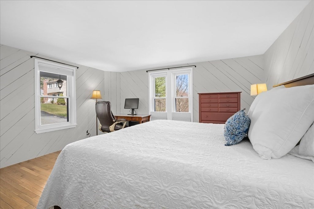 11 Merrill Road Sutton, MA 01590 - Photo 21 of 42 a bedroom with a bed and window