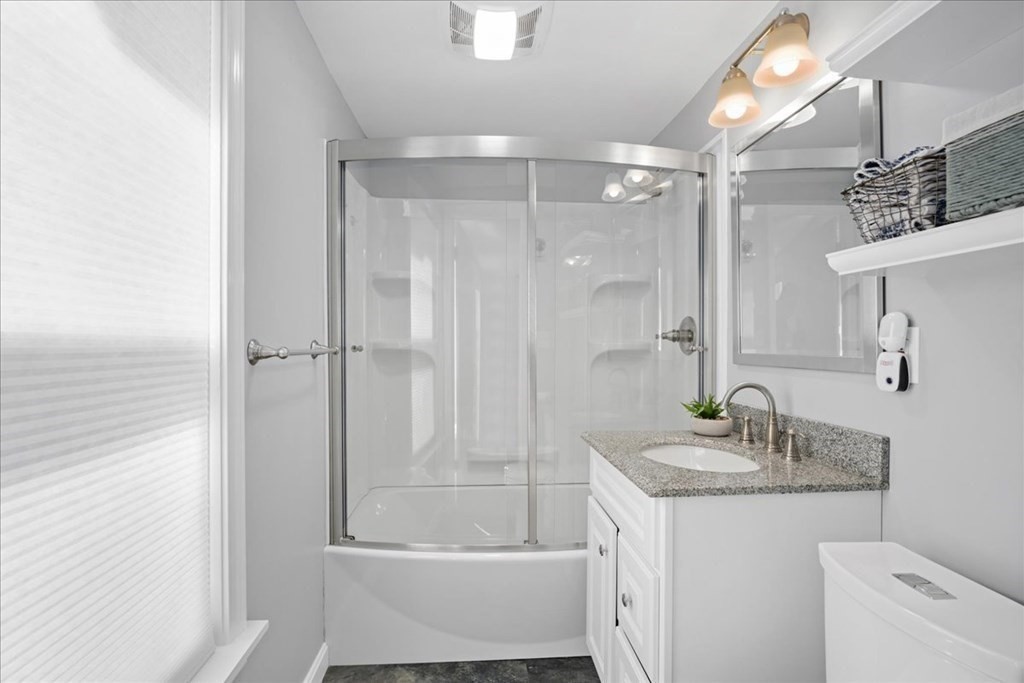 11 Merrill Road Sutton, MA 01590 - Photo 26 of 42 a bathroom with a granite countertop sink a toilet and shower