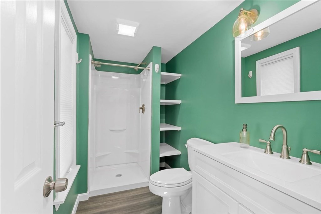 11 Merrill Road Sutton, MA 01590 - Photo 32 of 42 a bathroom with a toilet and a sink