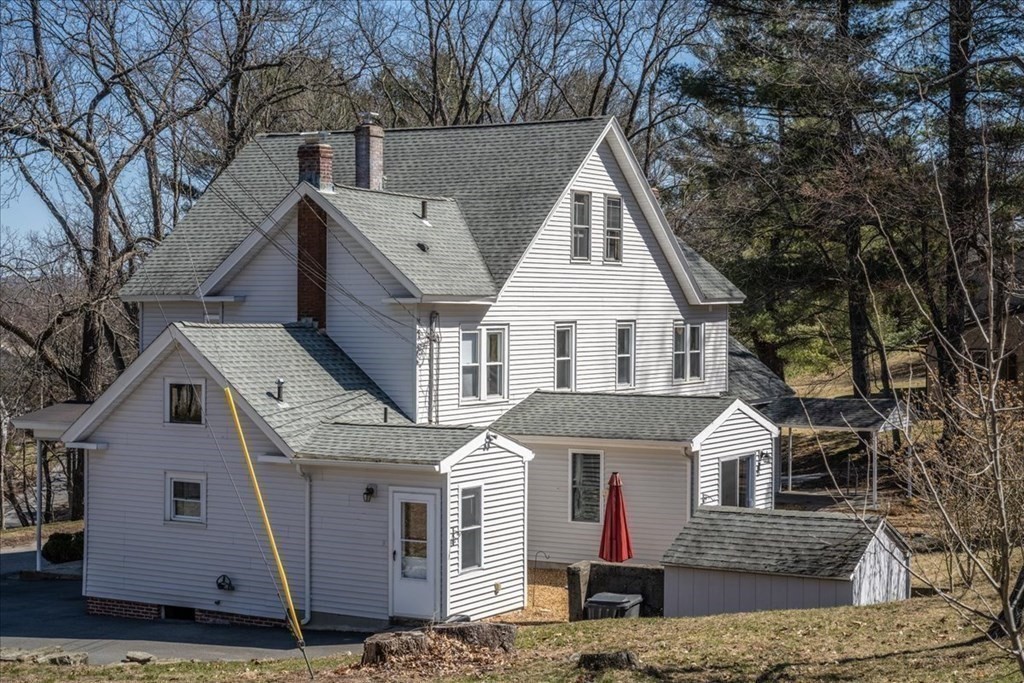 11 Merrill Road Sutton, MA 01590 - Photo 40 of 42 a view of house with a yard