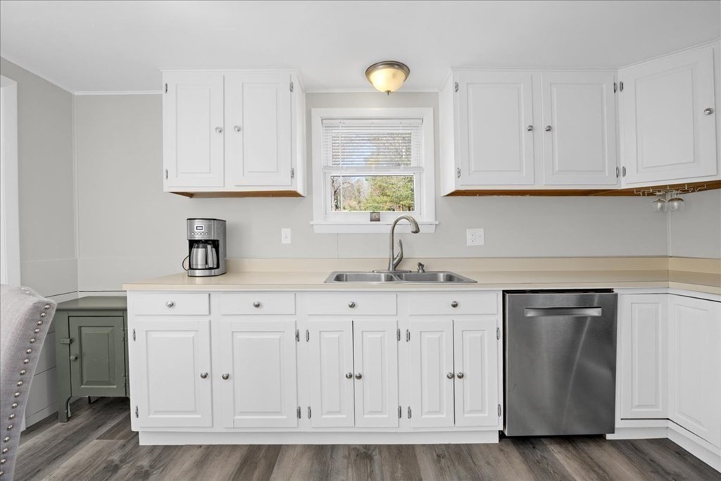 11 Merrill Road Sutton, MA 01590 - Photo 9 of 42 a kitchen with white cabinets white stainless steel appliances and sink