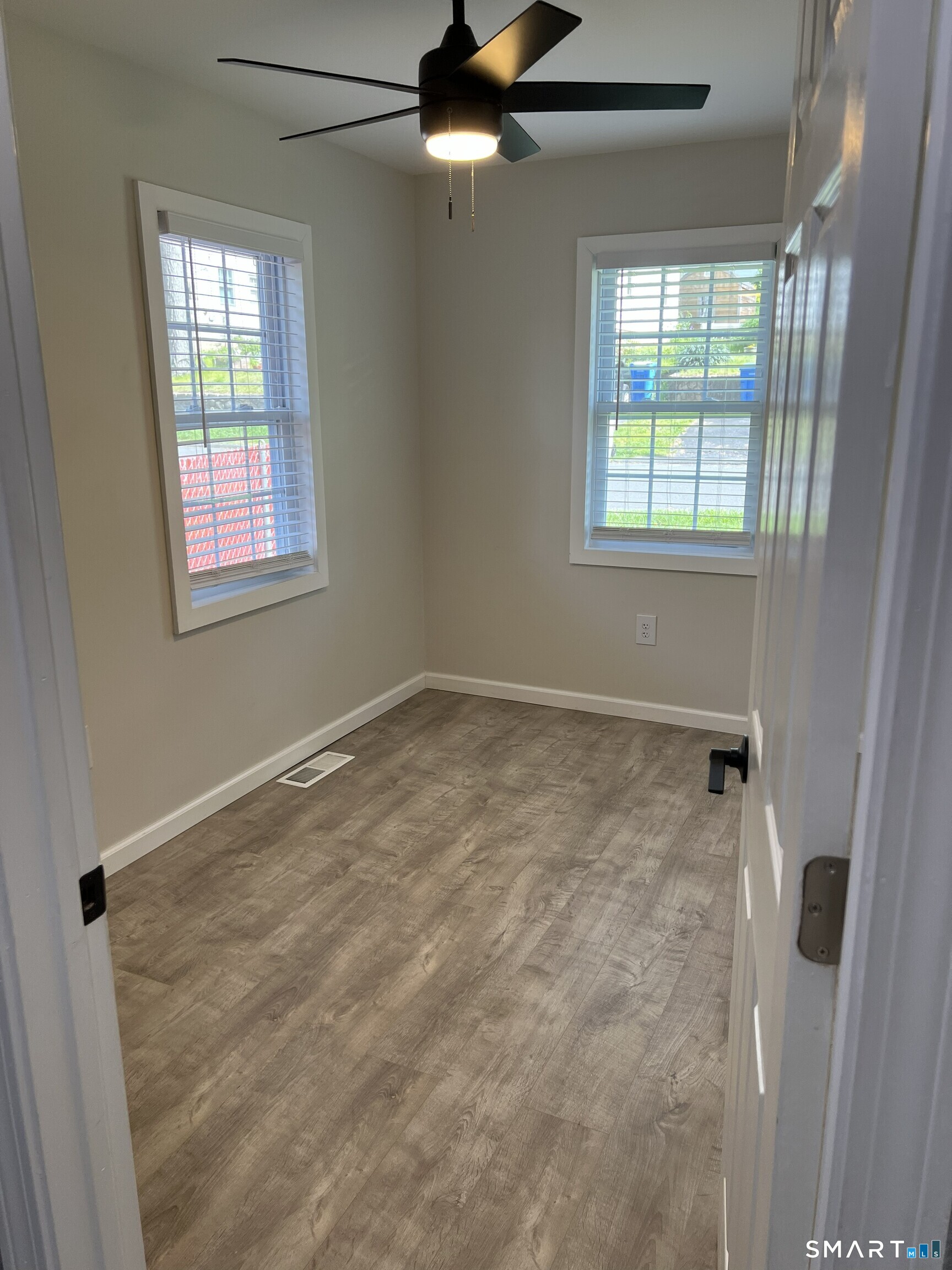 82 Bingham Street Bristol, CT 06010 - Photo 24 of 40 a view of an empty room with a window
