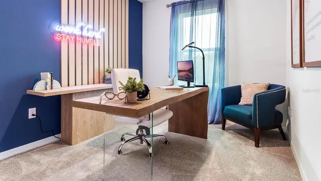 a bathroom with a sink a toilet a mirror a vanity and bathtub