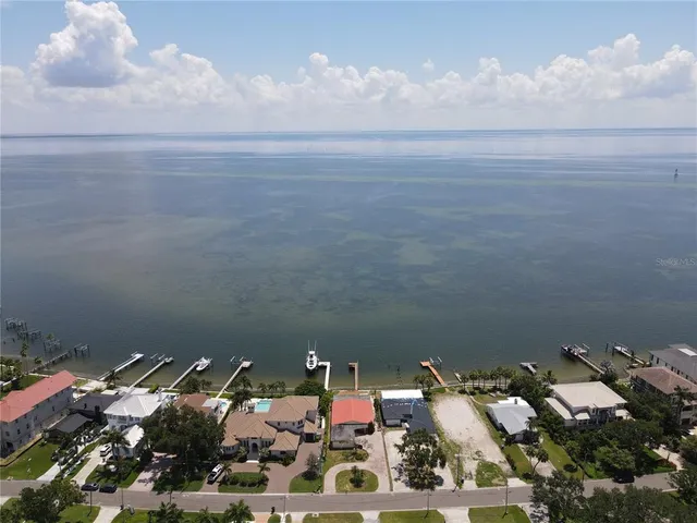 a view of a balcony with chairs