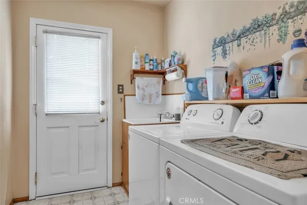 a kitchen with a stove and cabinets