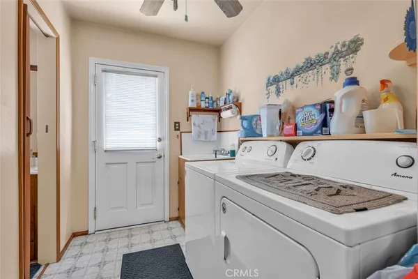 a kitchen with a stove and cabinets