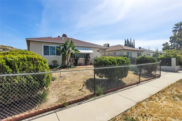 a view of house with outdoor space